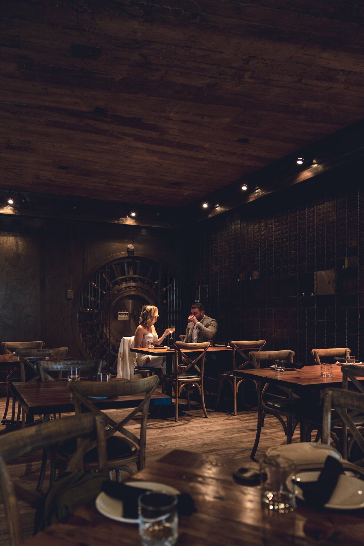 Couple sharing a cozy moment over cocktails at Felina in Ridgewood, NJ.