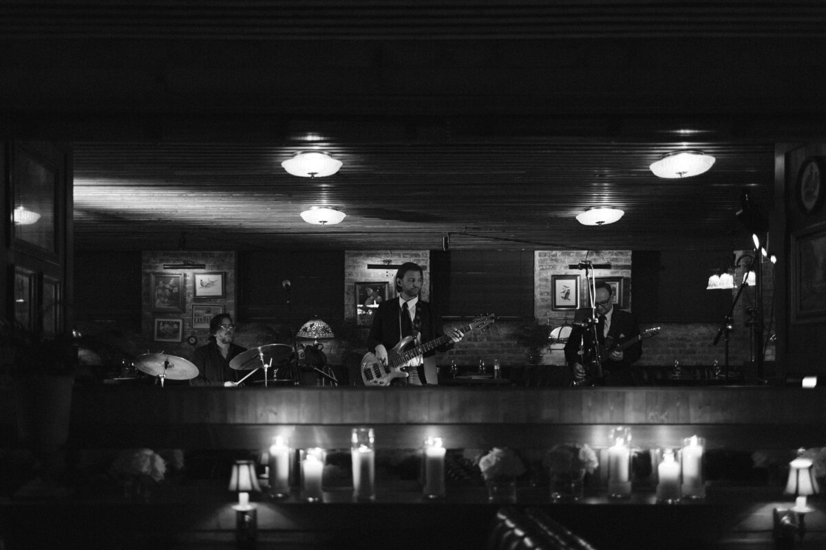 Fashion forward editorial wedding photography showcases reception celebration at Trivoli Tavern Chicago, featuring Lauren Alatriste's sophisticated approach combining celebration energy with magazine-worthy aesthetics and authentic wedding day emotion.