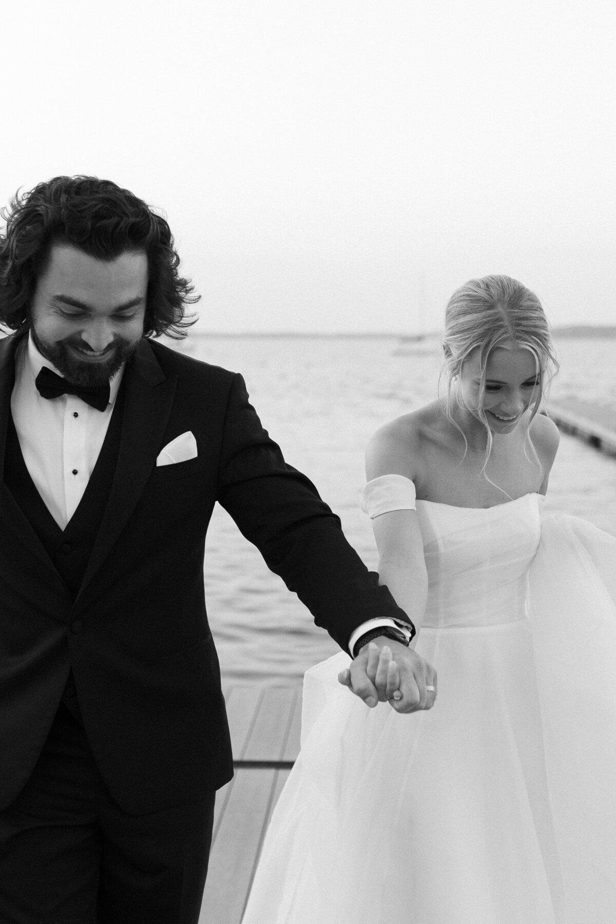 A stunning couple’s portrait by the shores of Lake Mendota at The Memorial Union, capturing the vibrant energy and iconic beauty of this Madison landmark.