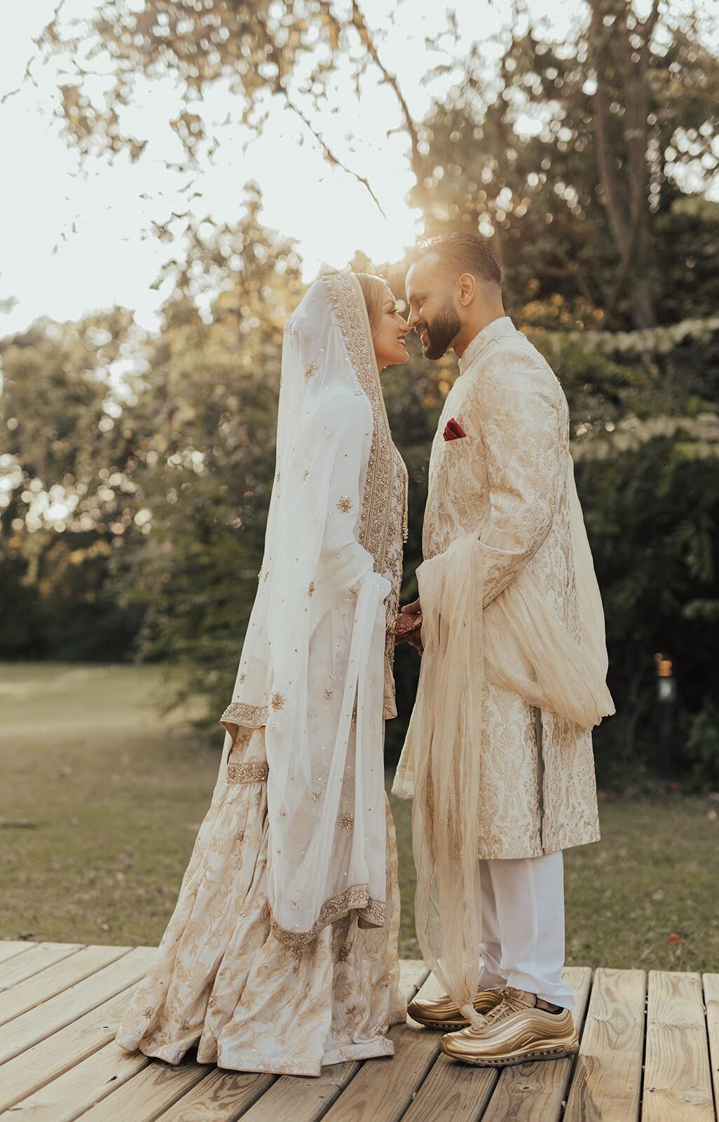 Bride and groom get close before their wedding at the Bowery house and gardens.