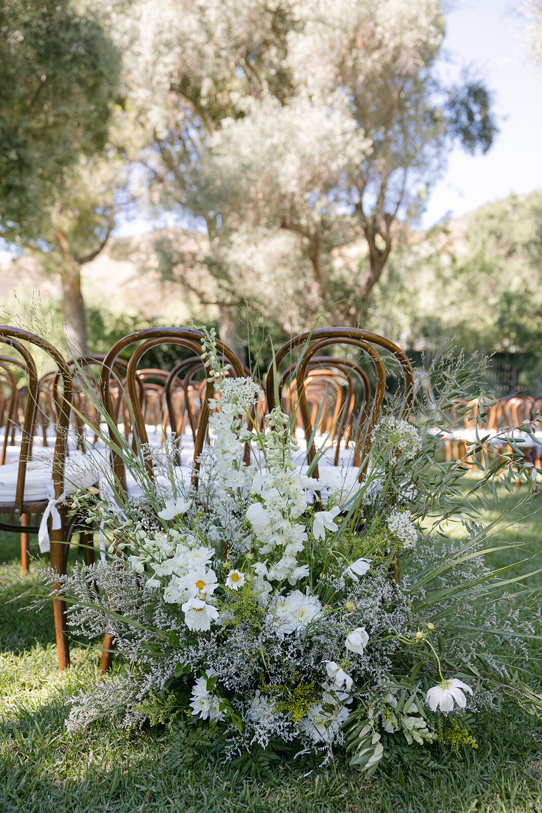 White and Green Wedding Ceremony Flowers at Hummingbird Nest Ranch