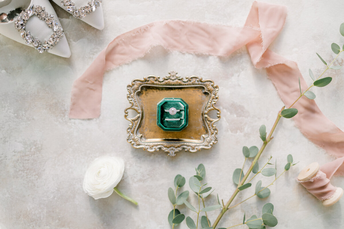 close up shot of ring and wedding details