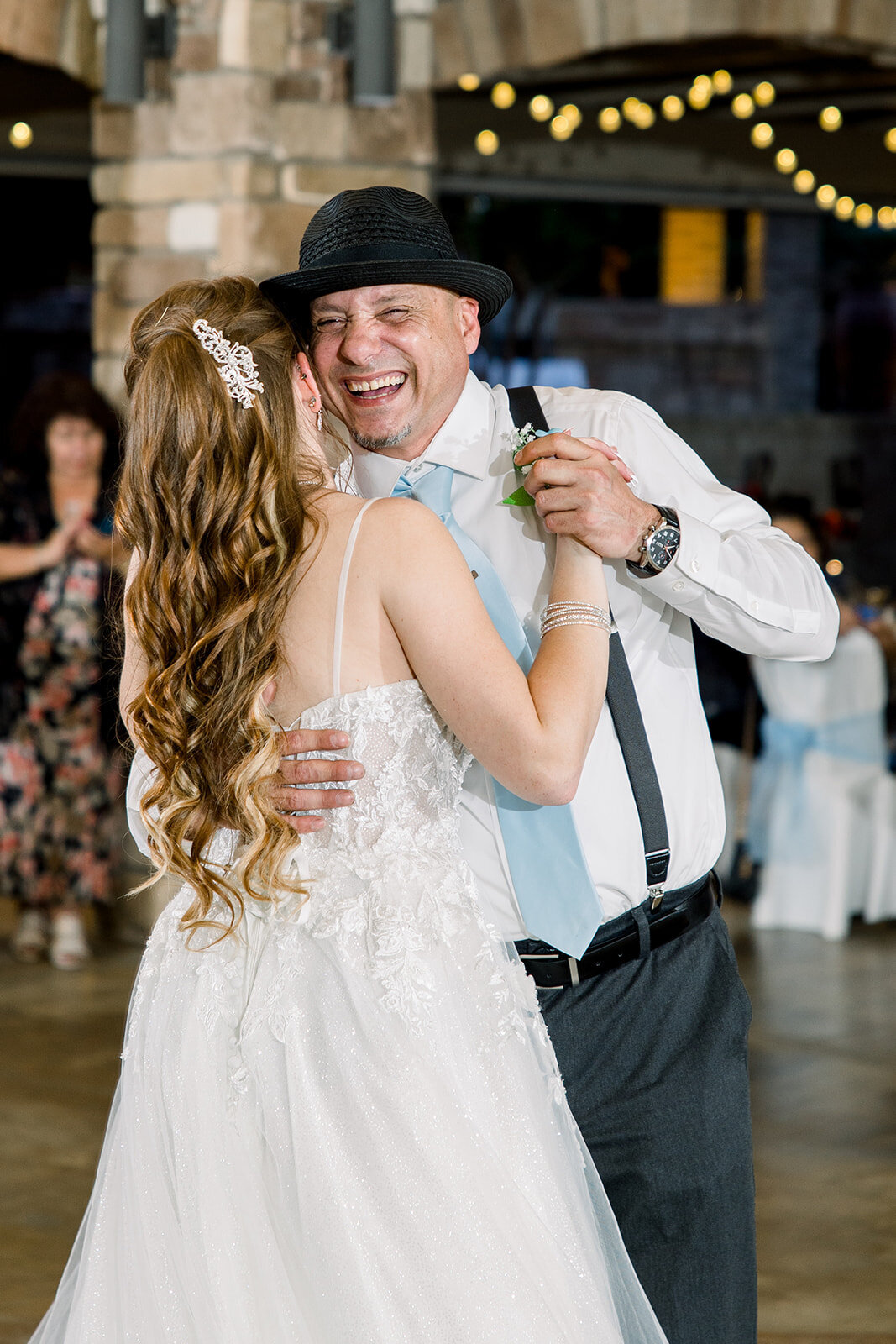 Bride and her father share a dance during the reception at the pavillion