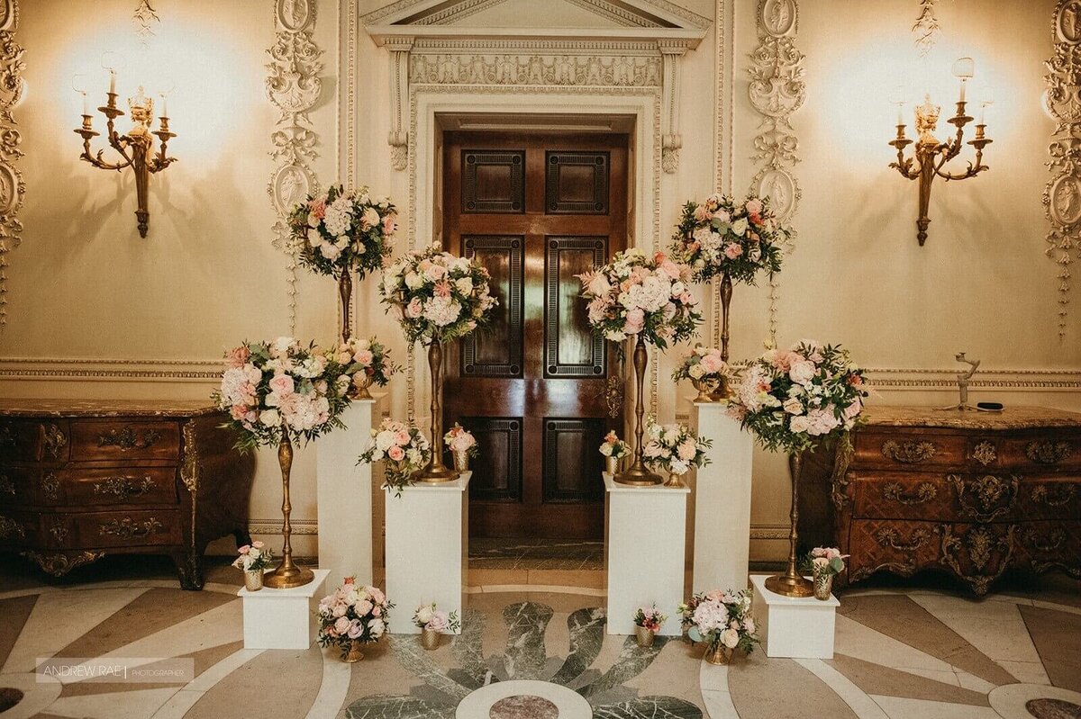 Beautiful entry waty styled with florals by Wildflower and Willow
