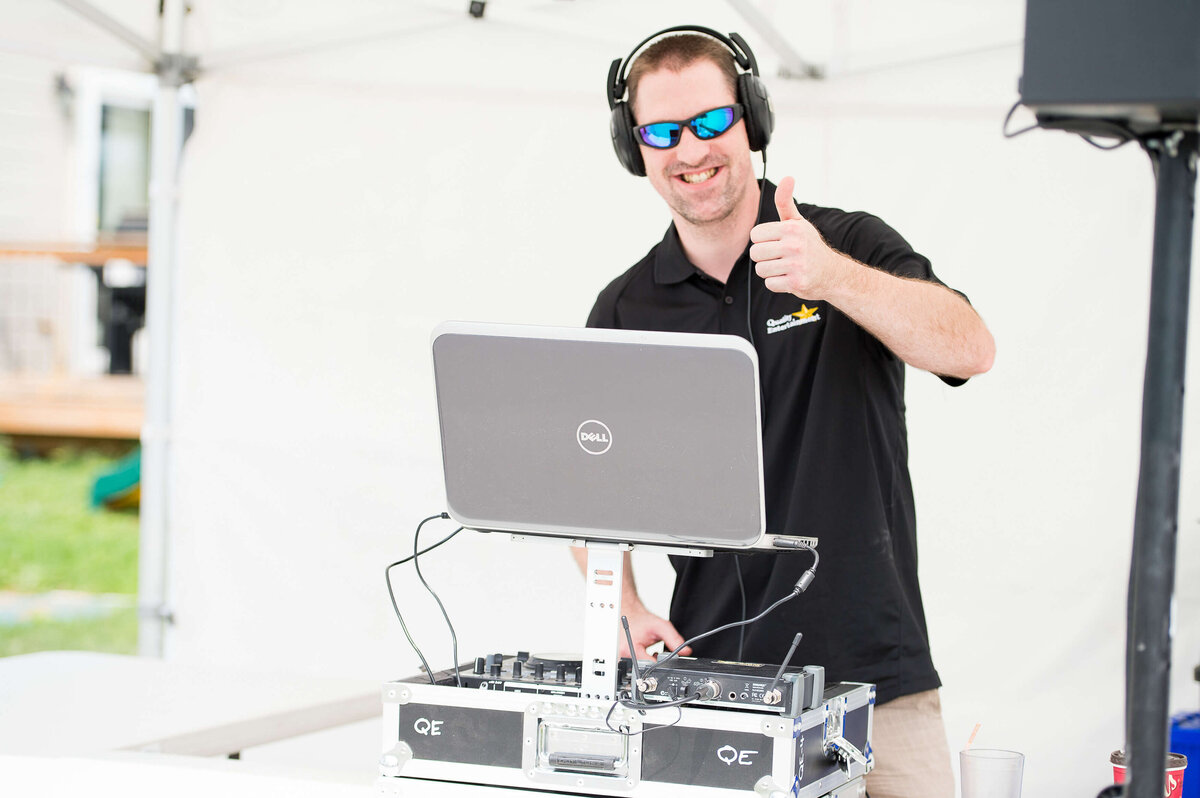 Ottawa event photos showing a DJ playing music during a corporate children's event.  Captured by JEMMAN Photography COMMERCIAL