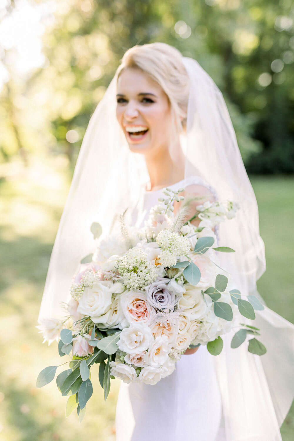 smiling bride's bouquet