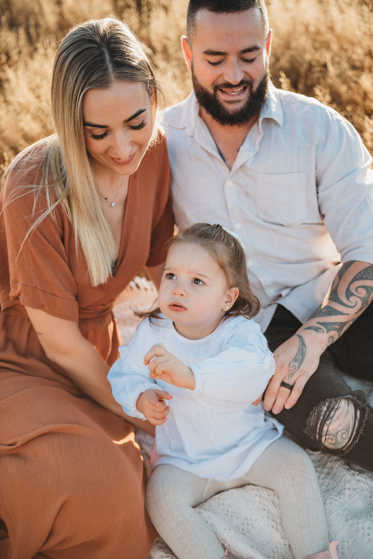 a family posing during a Queenstown family photography session captured by Bie
