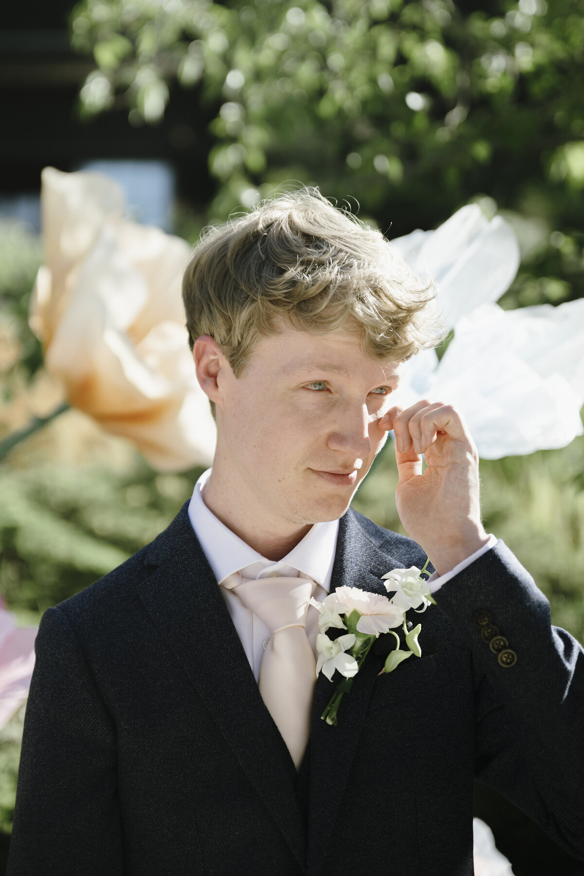 Groom looking at bride crying