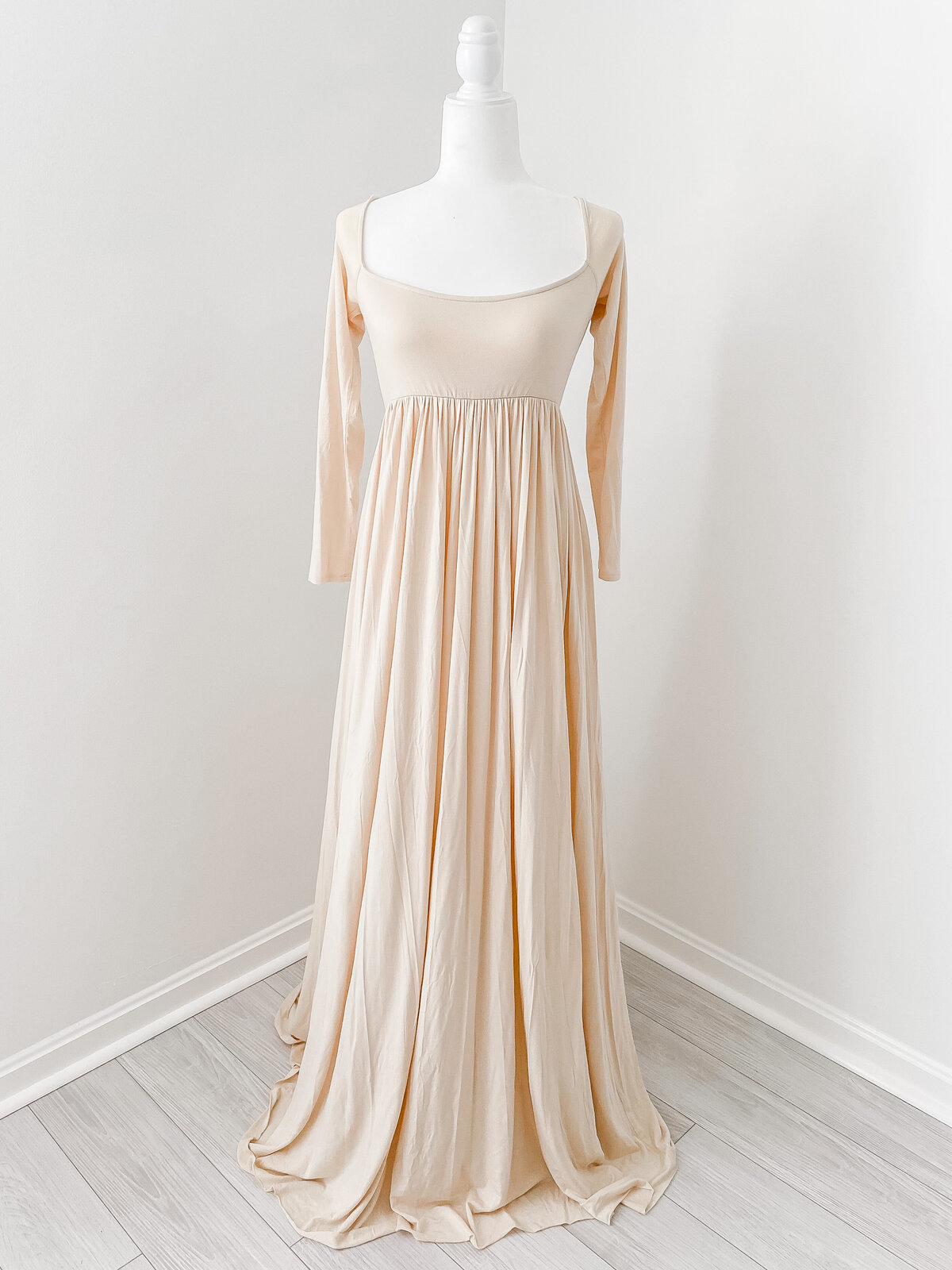 A long sleeve cream colored maxi dress from DC Family Photographer's client wardrobe