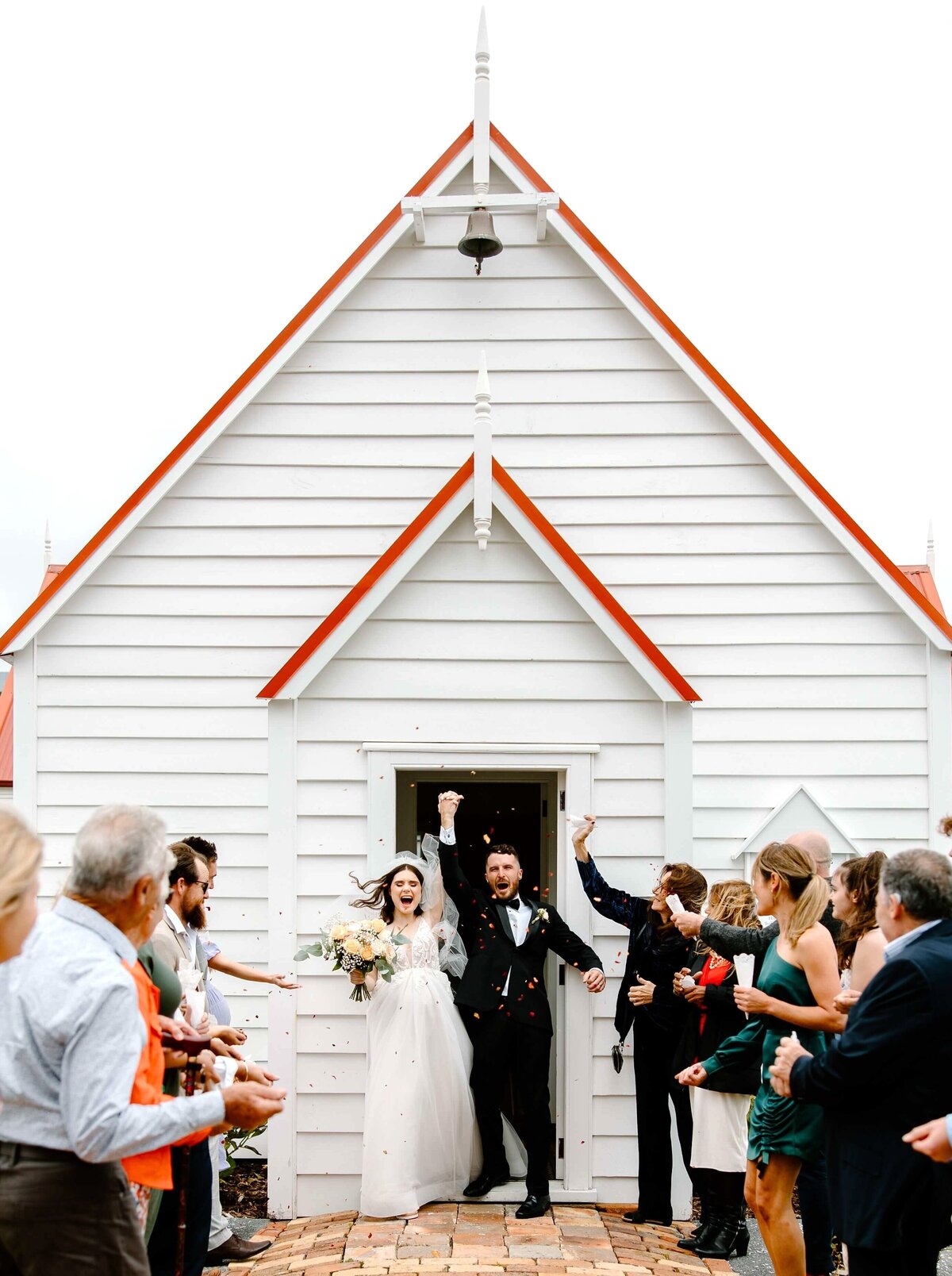 mini wedding ceremony at charming Auckland little white chapel