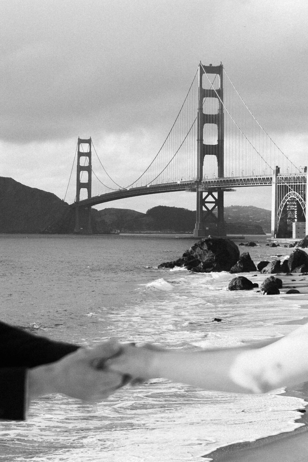 Bride and Groom at Marshall's Beach in San Francisco, California at sunset
