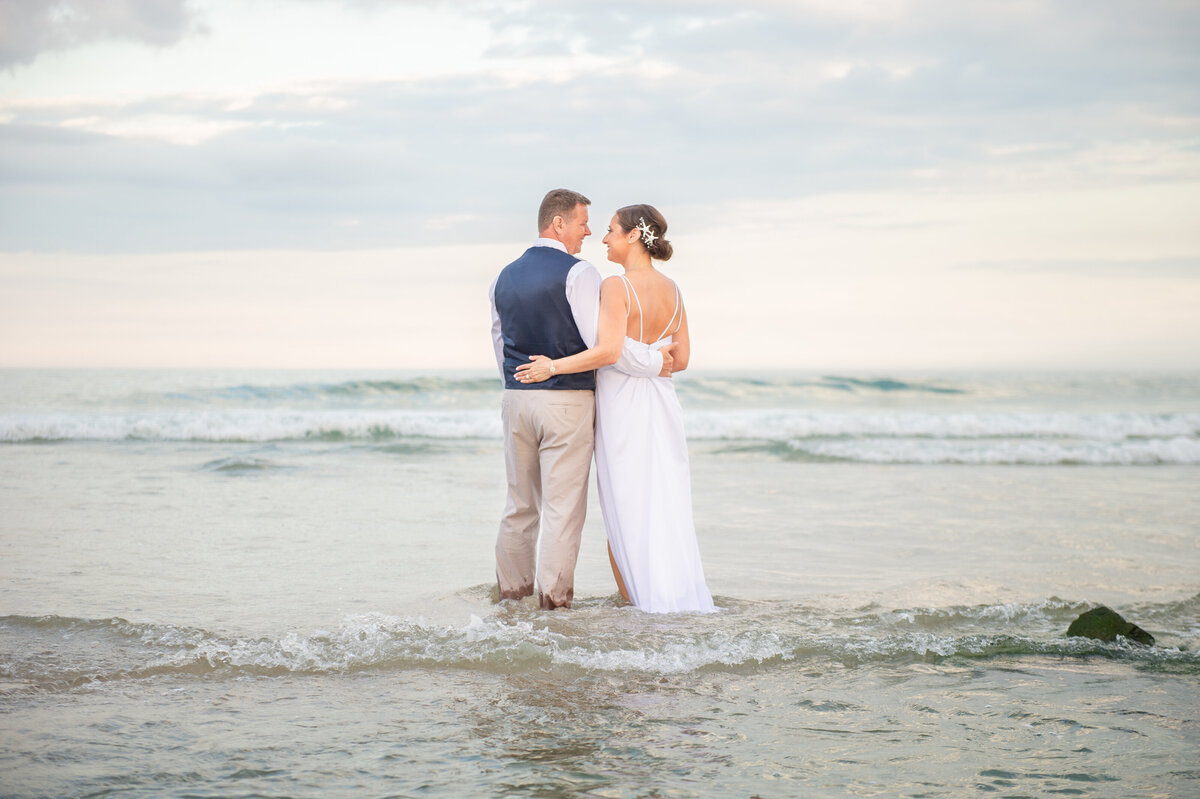 bride in groom in ocean in holgate