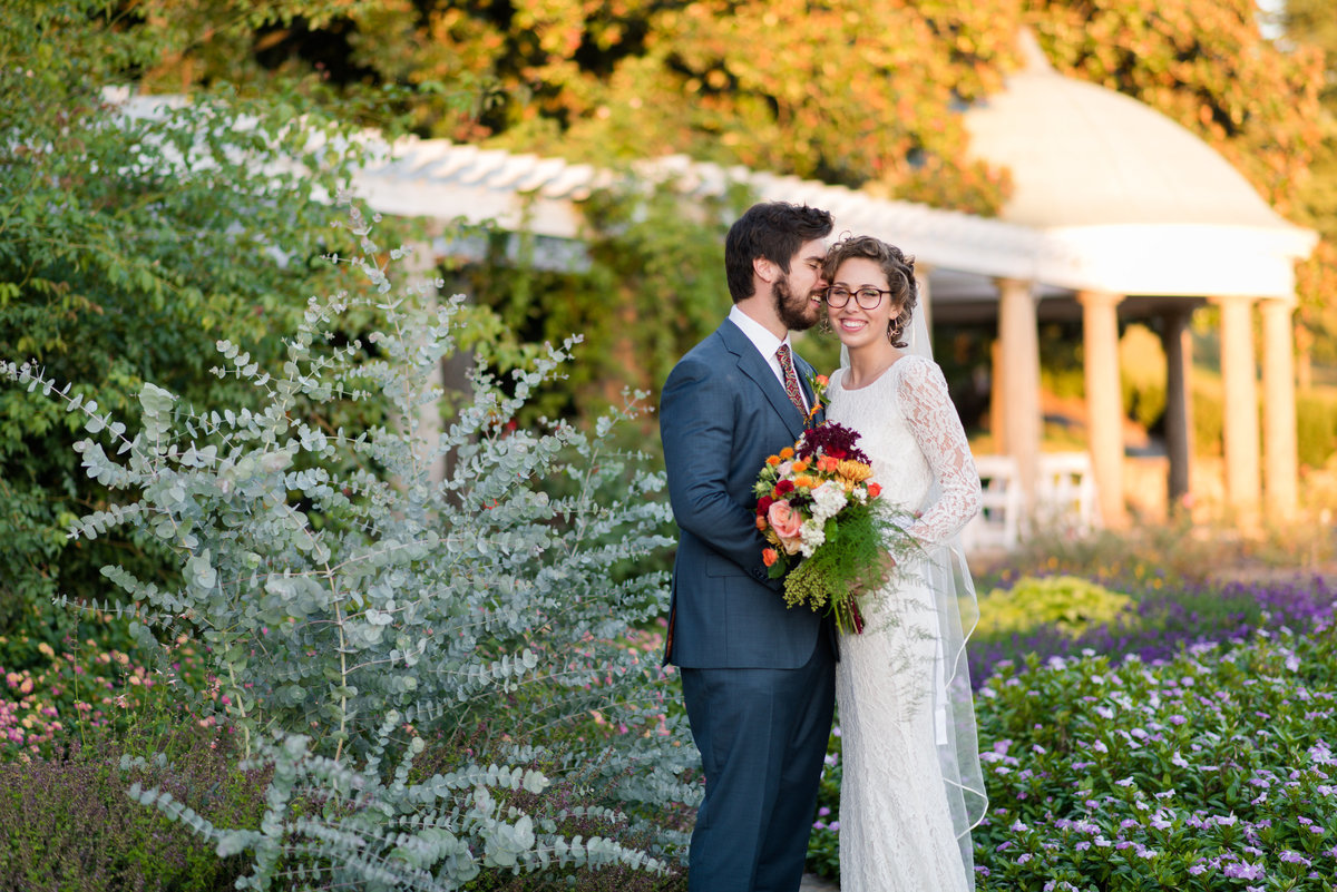 bride and groom laughing at maymont park wedding in richmond by rva wedding photographer