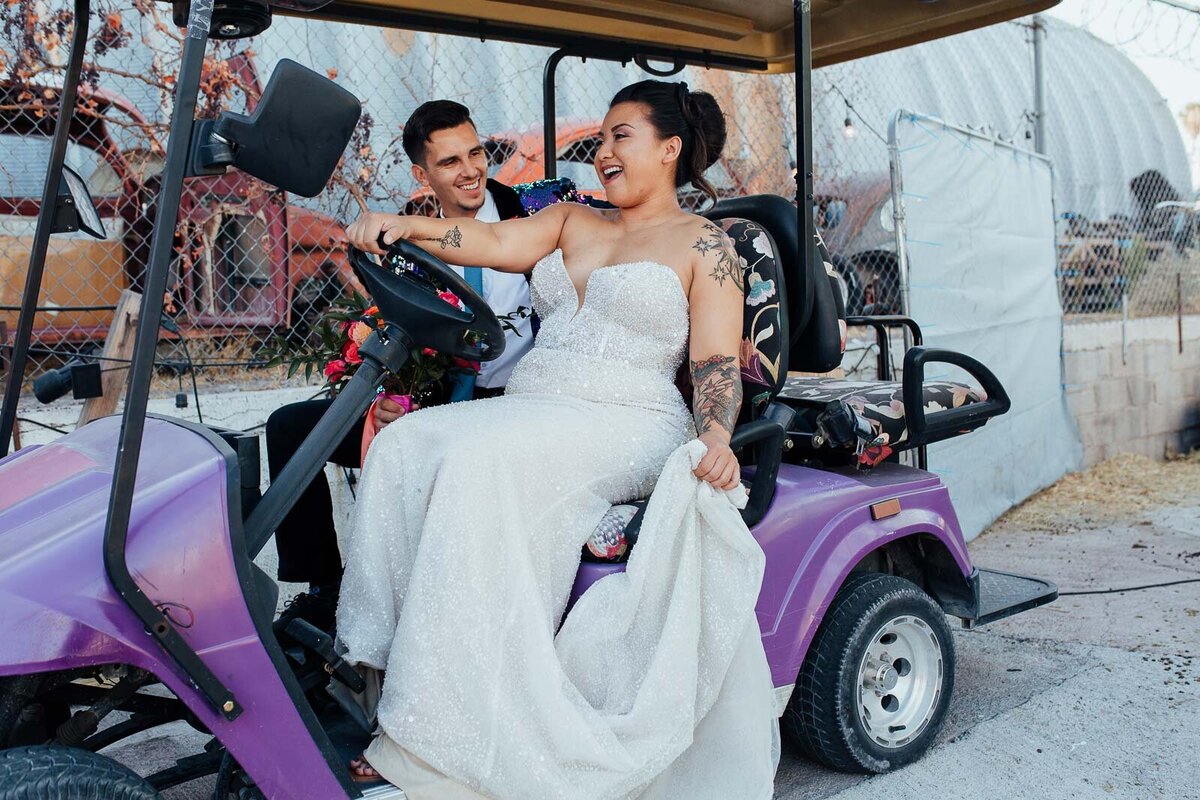 Couple on purple golf cart  at The Doyle Las Vegas