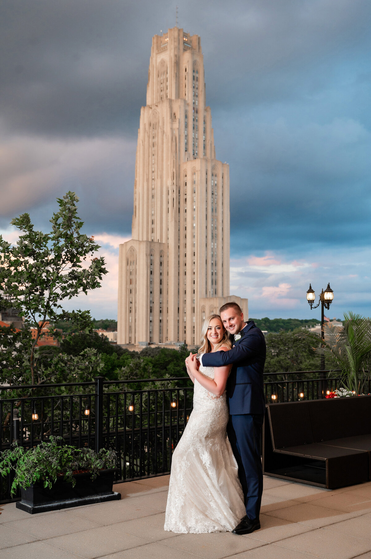 wedding pic of a couple overlooking the cathedral of learning on their wedding day