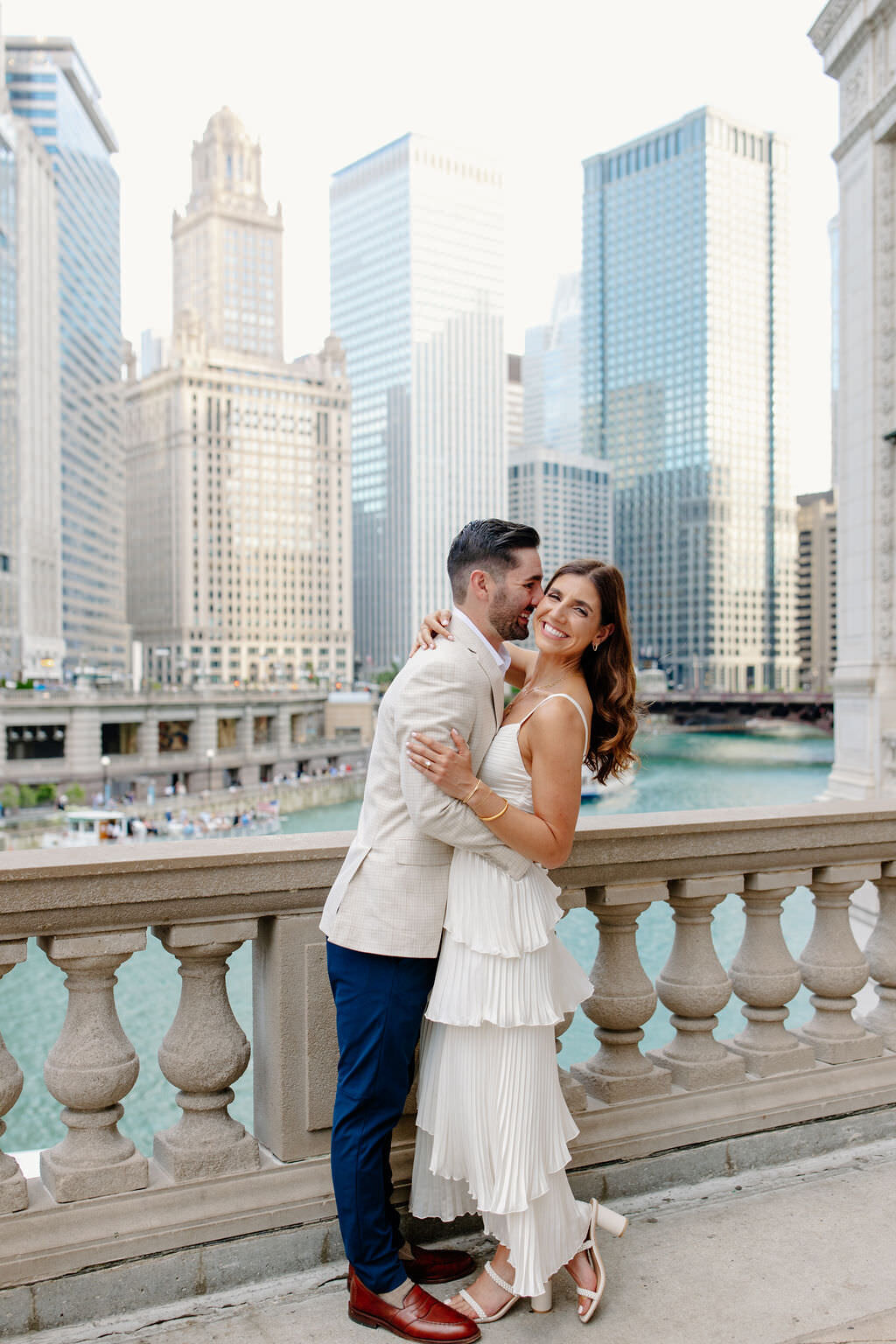 An engagement photography session at The Wrigley Building and North Ave Beach in Chicago, Illinois - 11