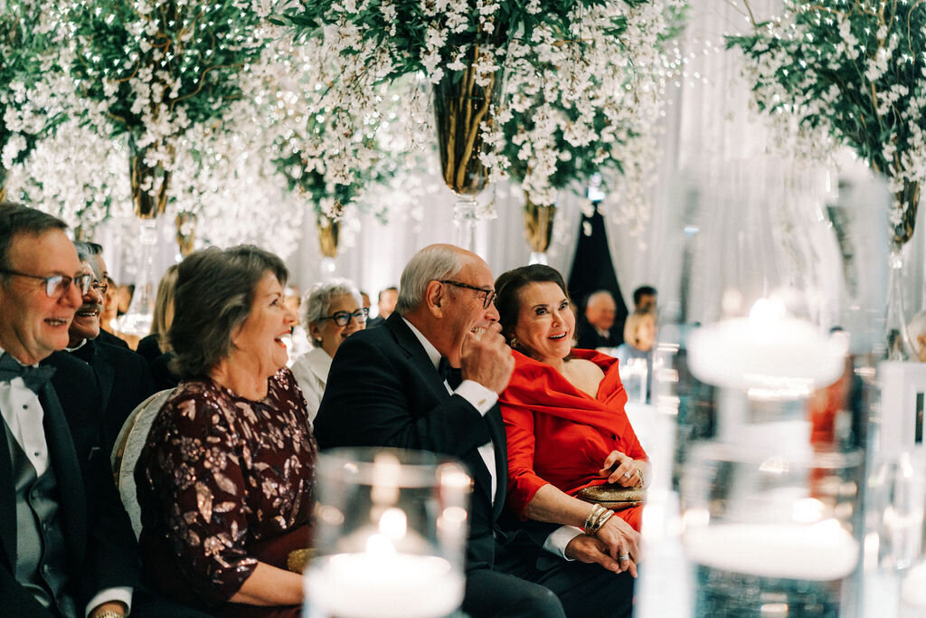 Candid photo of the wedding guests at The Langham. 
