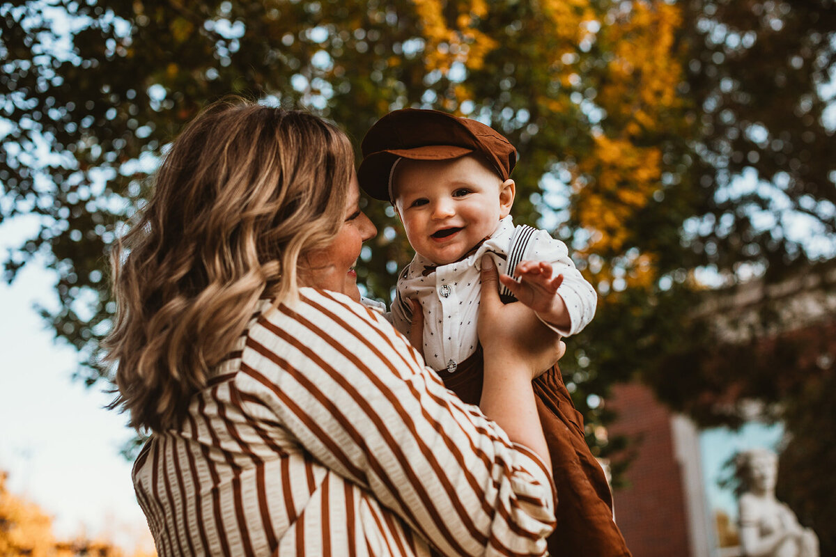 mom holds son 