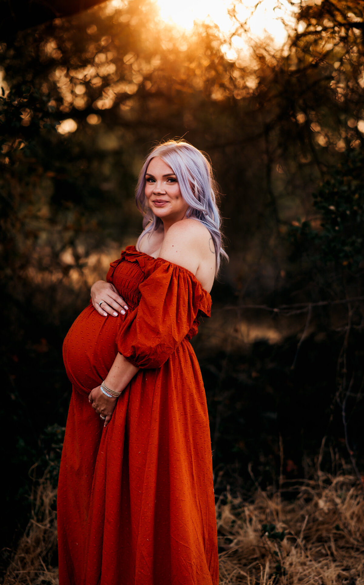 Maternity portrait in rust gown at sunset — view maternity and newborn gallery