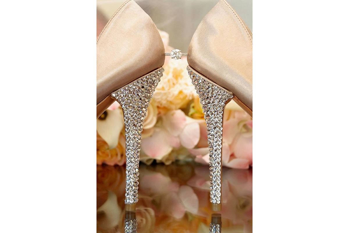 ring between wedding shoes