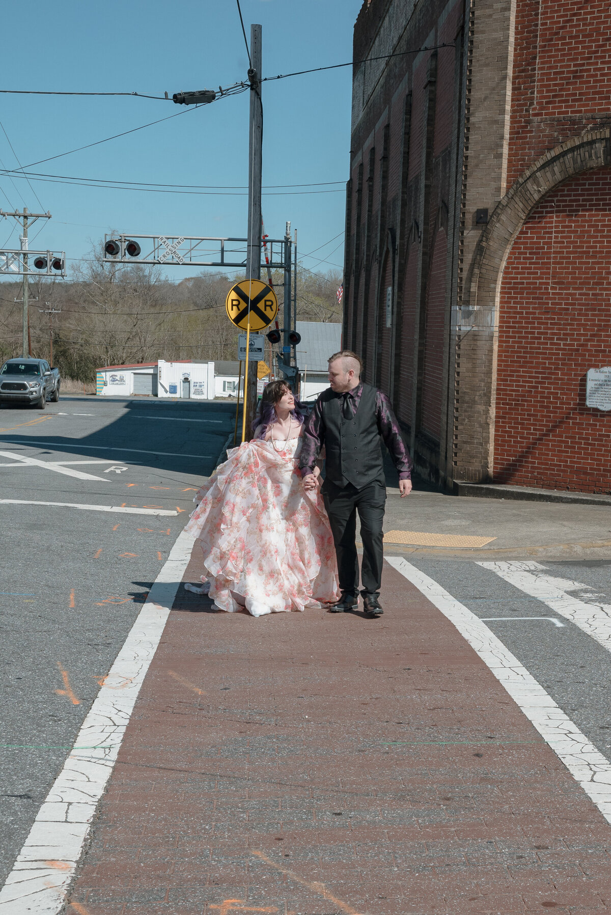 Bride and Groom walking downtown Madison NC