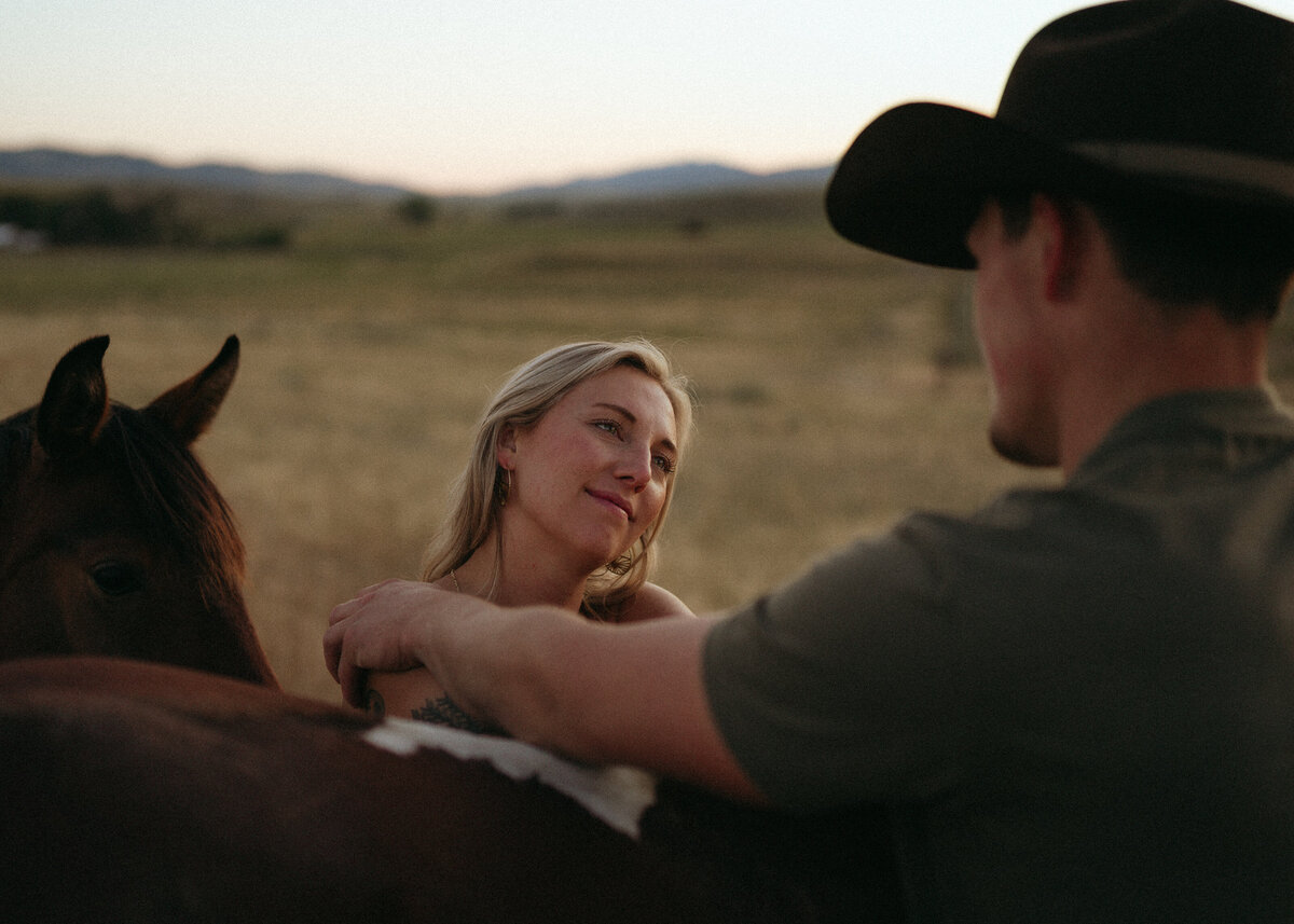 Couple during golden hour engagement shoot in Idaho wedding/elopement - photographed by The Storytellers