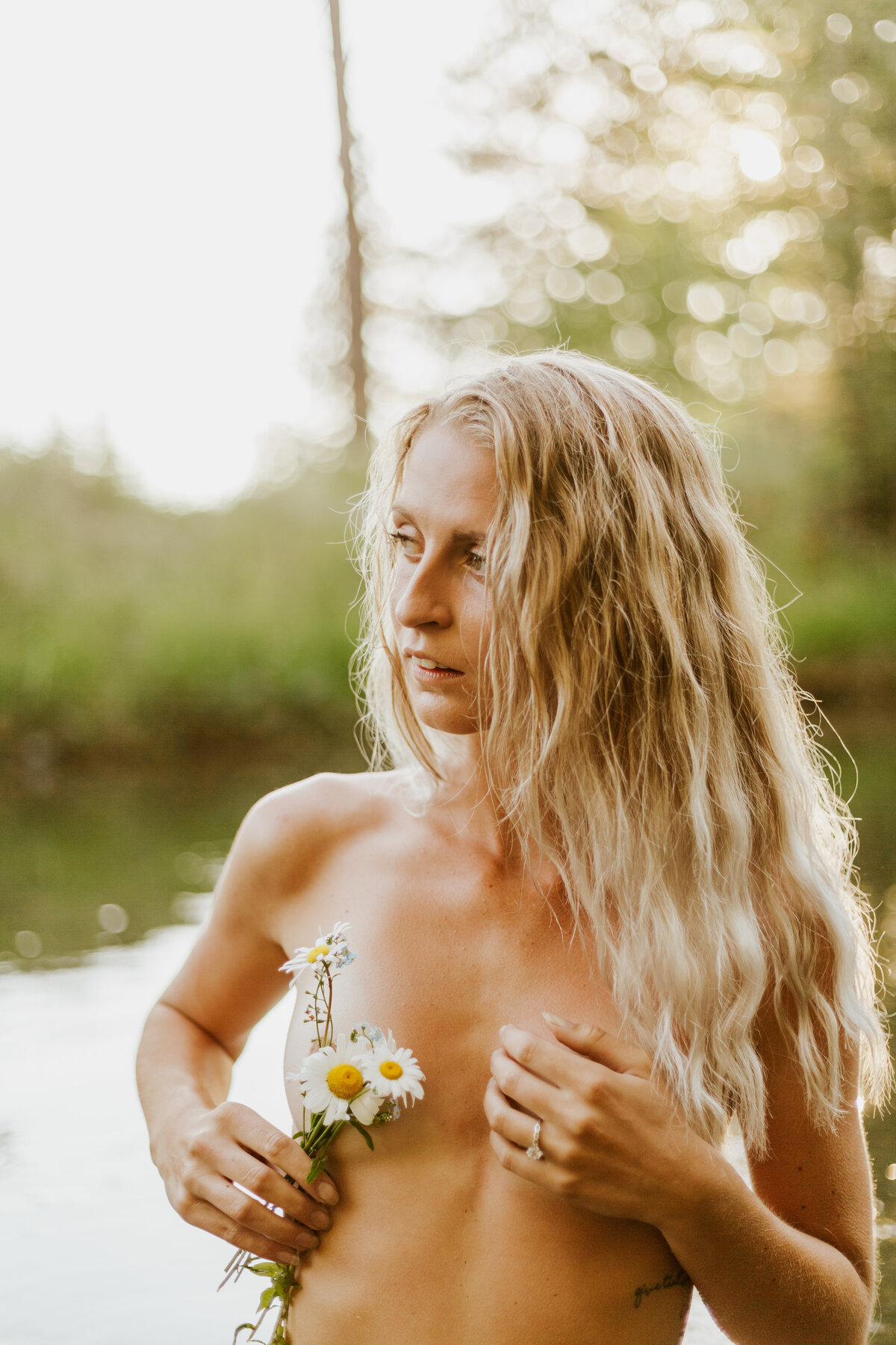 woman posing with flowers