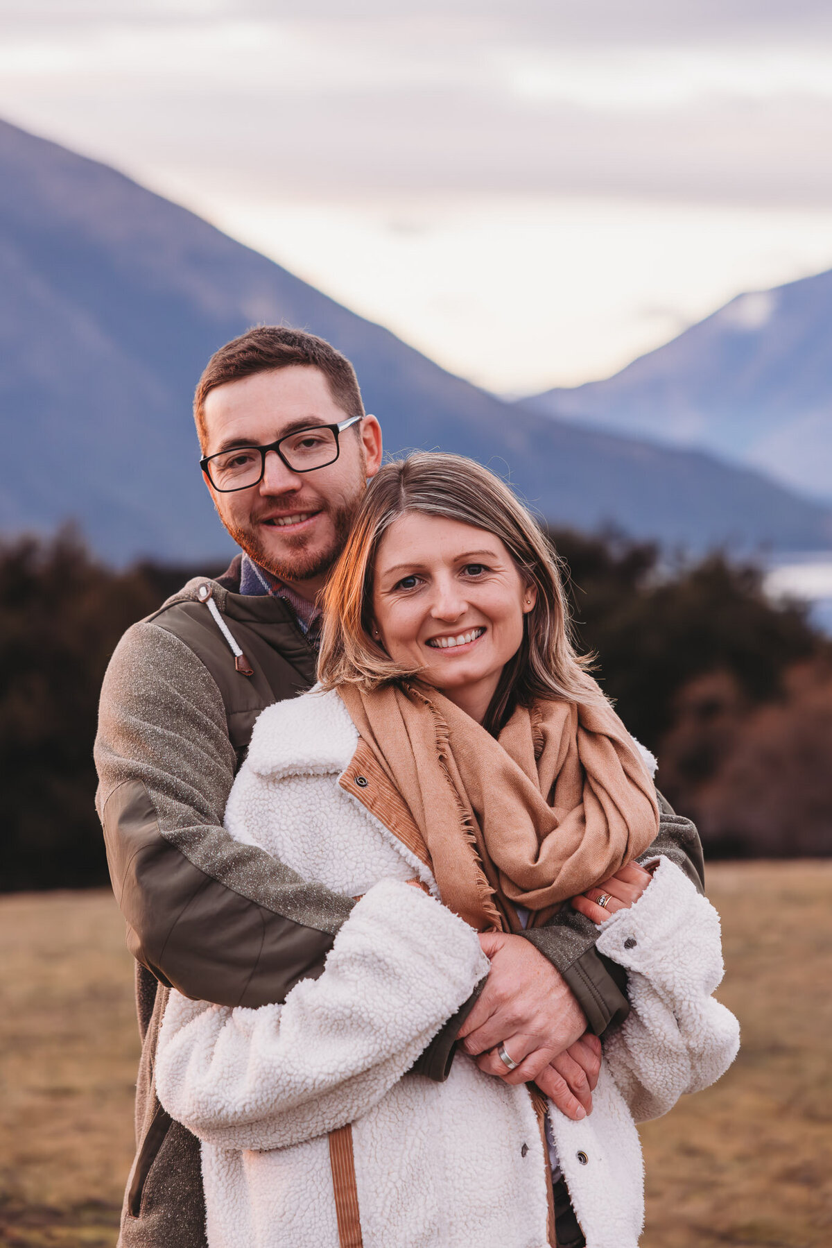 a couple standing hugging  during a wanaka couples photography session in wanaka captured by Bie
