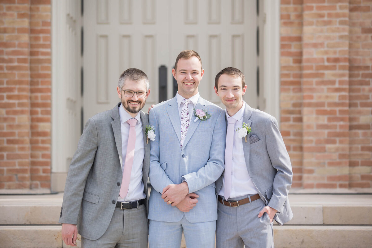 three men in suits