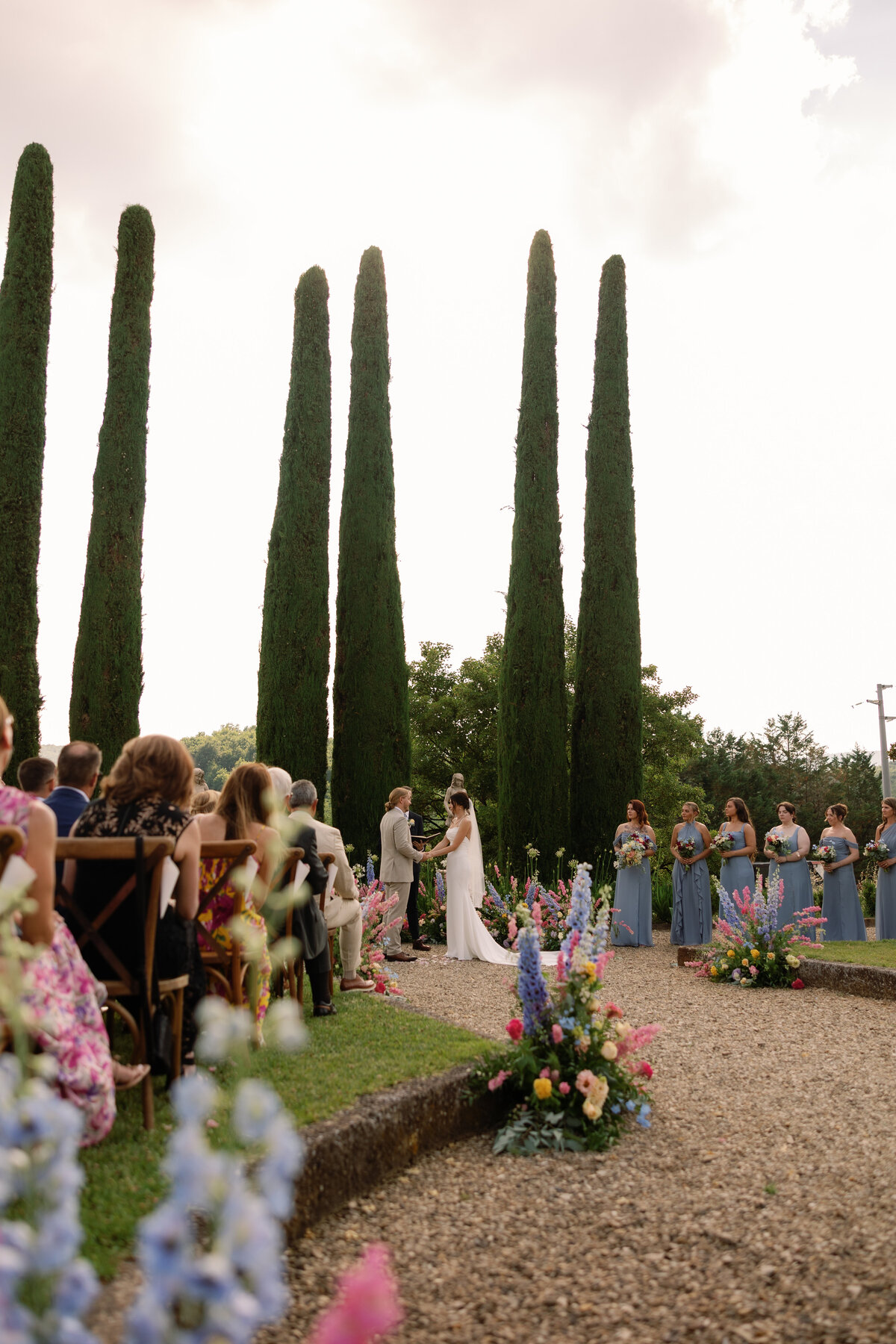 Just married couple walking down the aisle at Villa La Selva wedding