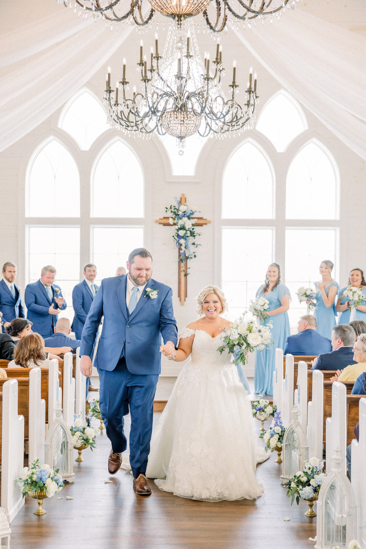 Bride and Groom walking down aisle after getting married