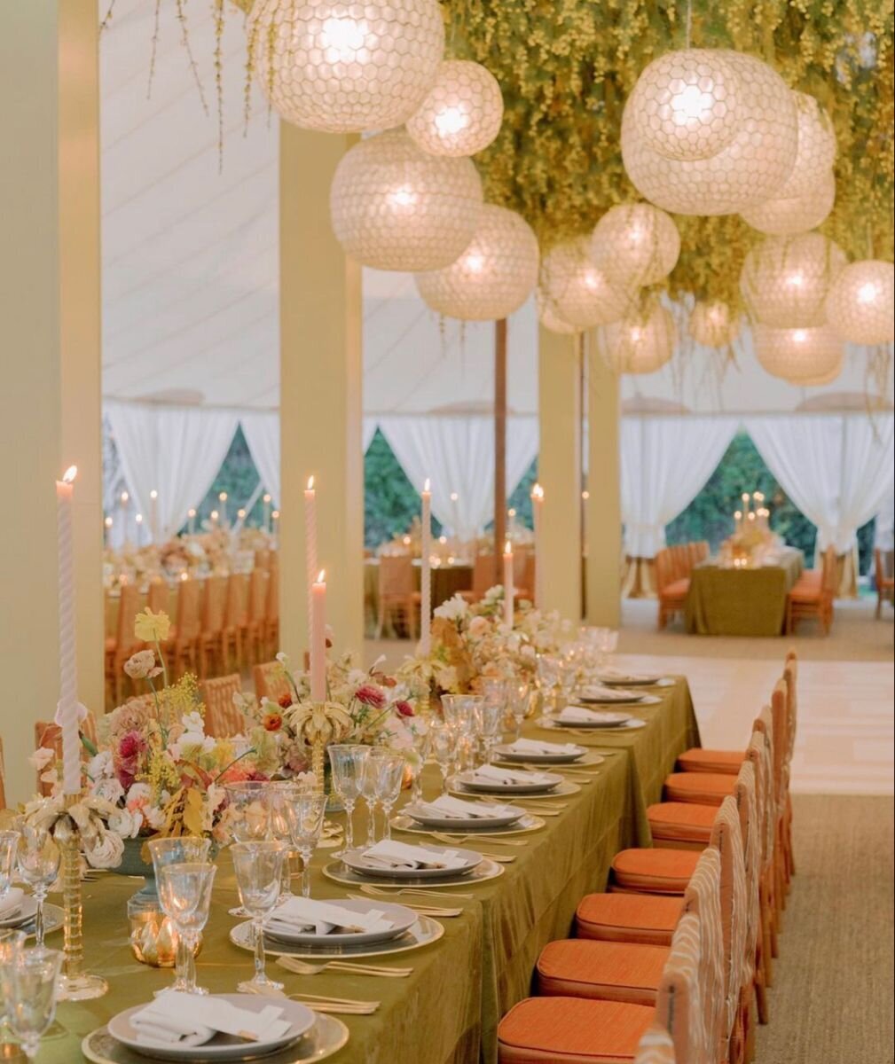 Tented garden wedding reception with oversized lanterns and soft green palette, styled for Airlie Gardens event inspiration