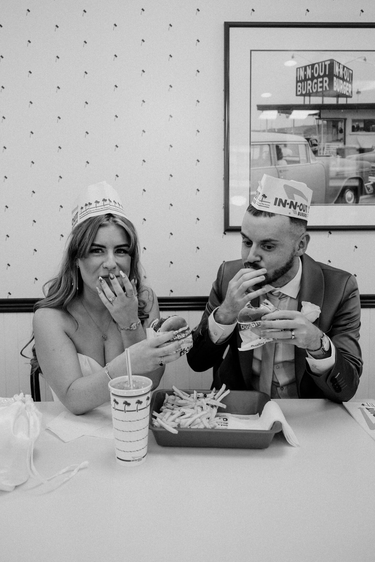 Two people eat burgers at In-N-Out in Las Vegas.