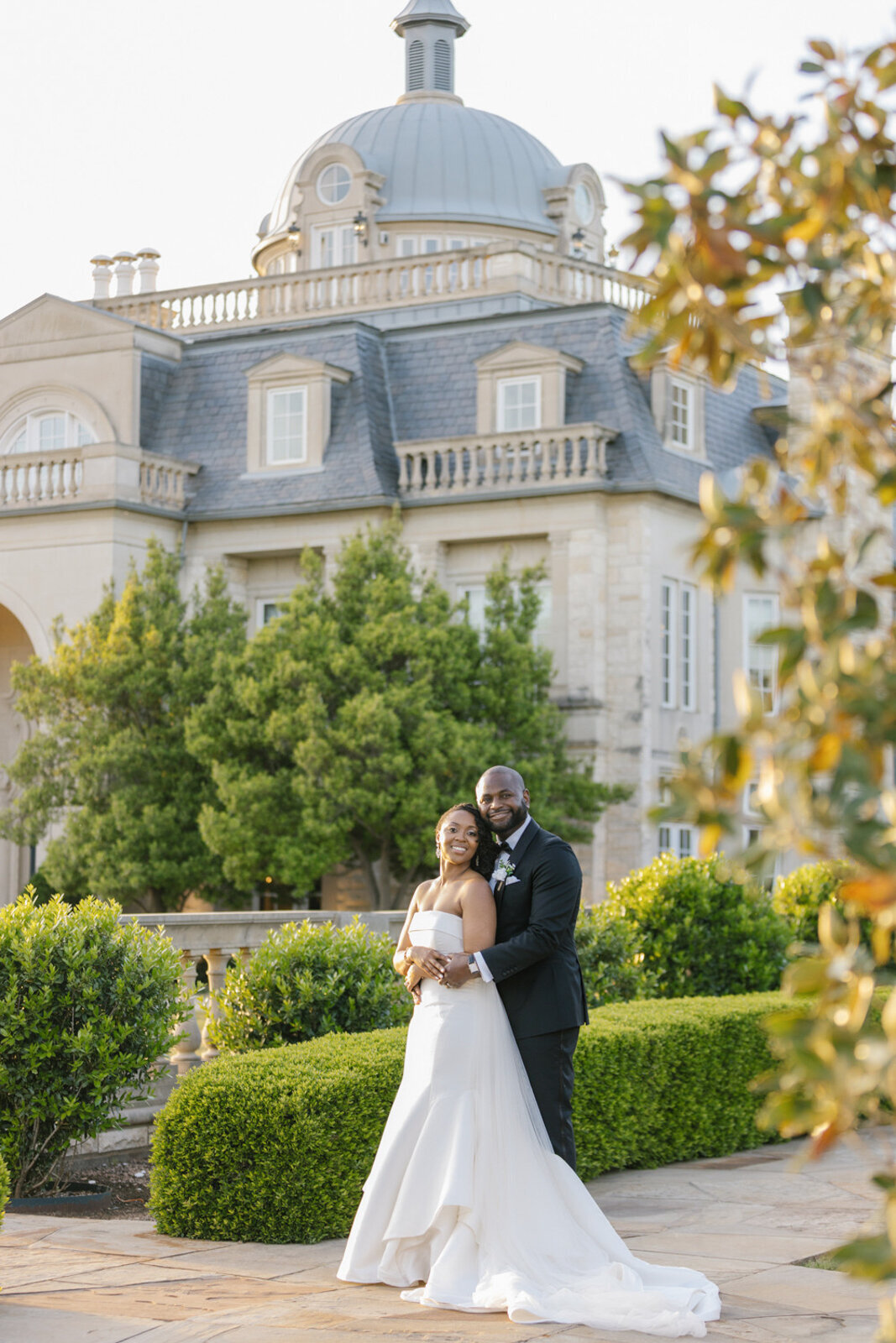 Sunset portrait of a couple near The Olana wedding venue, a beautiful chateau-style estate