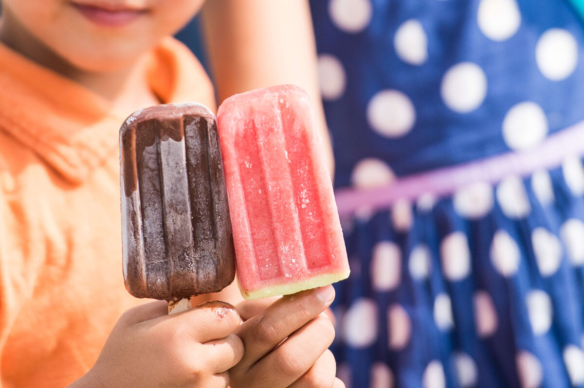 Ottawa event photos showing the popsicles given out to children during a corporate event.  Captured by JEMMAN Photography COMMERCIAL