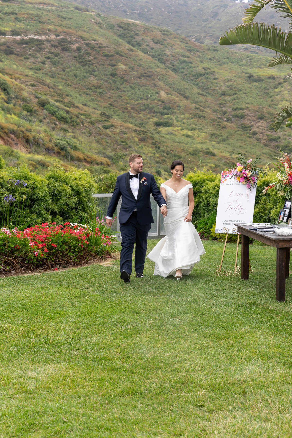 Bride and Groom walking toward the dance floor