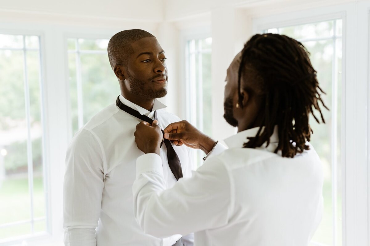 groom bow tie getting ready catskills wedding planner carey institute wedding canvas weddings