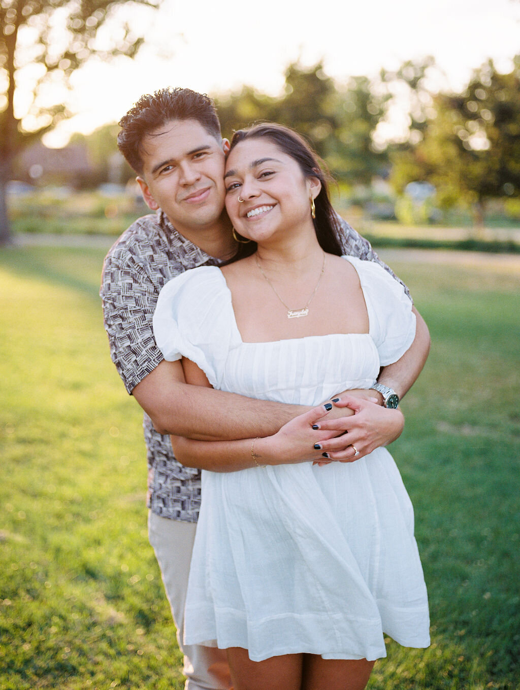 Film engagement photos at Washington Park in Denver, Colorado.