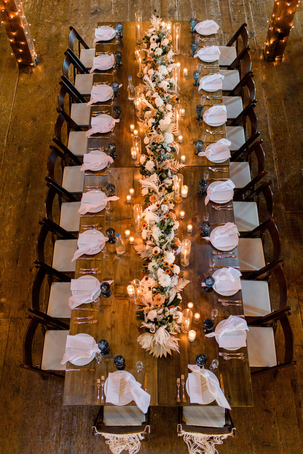 Love & Luster Floral Design Booking House protea toffee roses pampas grass boho wedding centerpiece head table