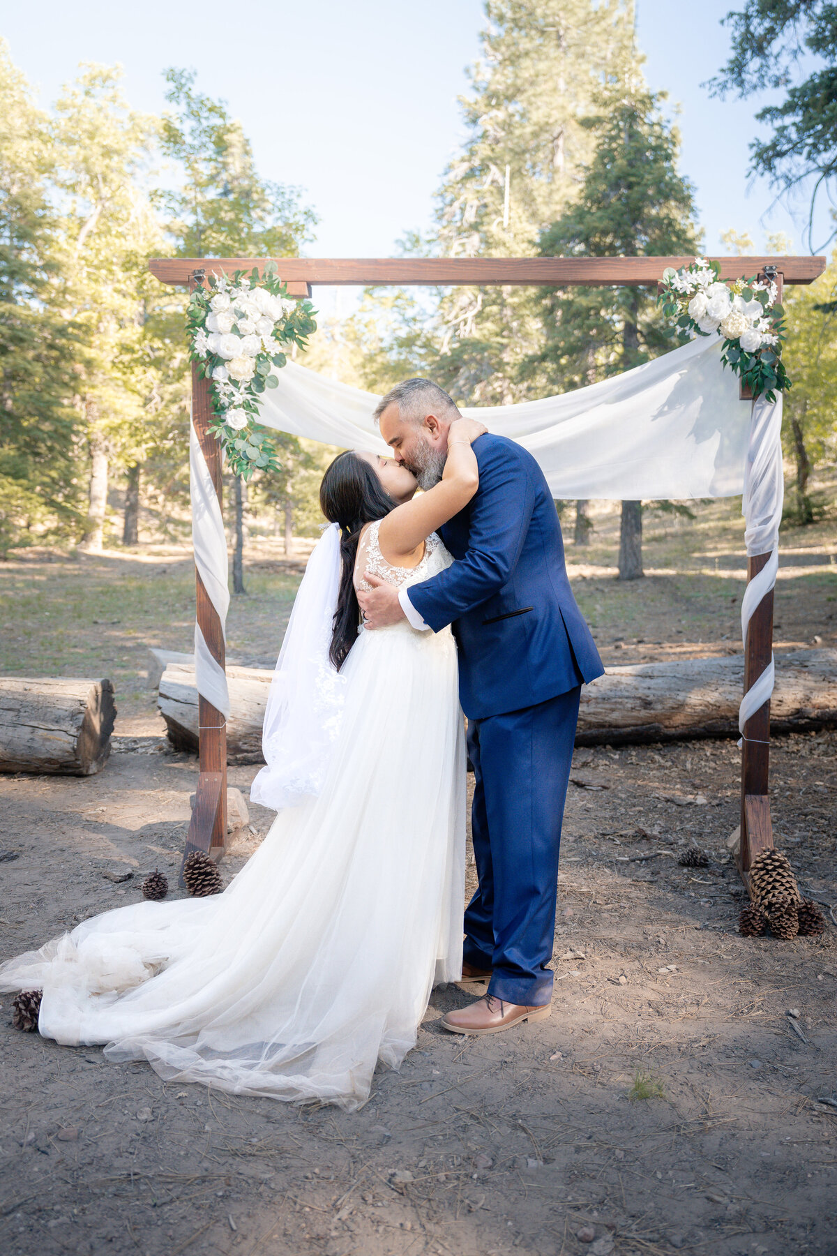 Bride and Groom eloping at Big Bear Buttercup Campground during elopement wedding ceremony.