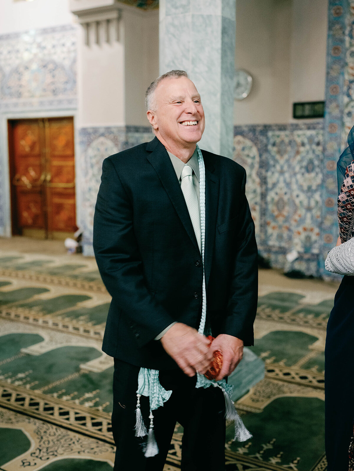 Dad smiles as he watches his daughter get married