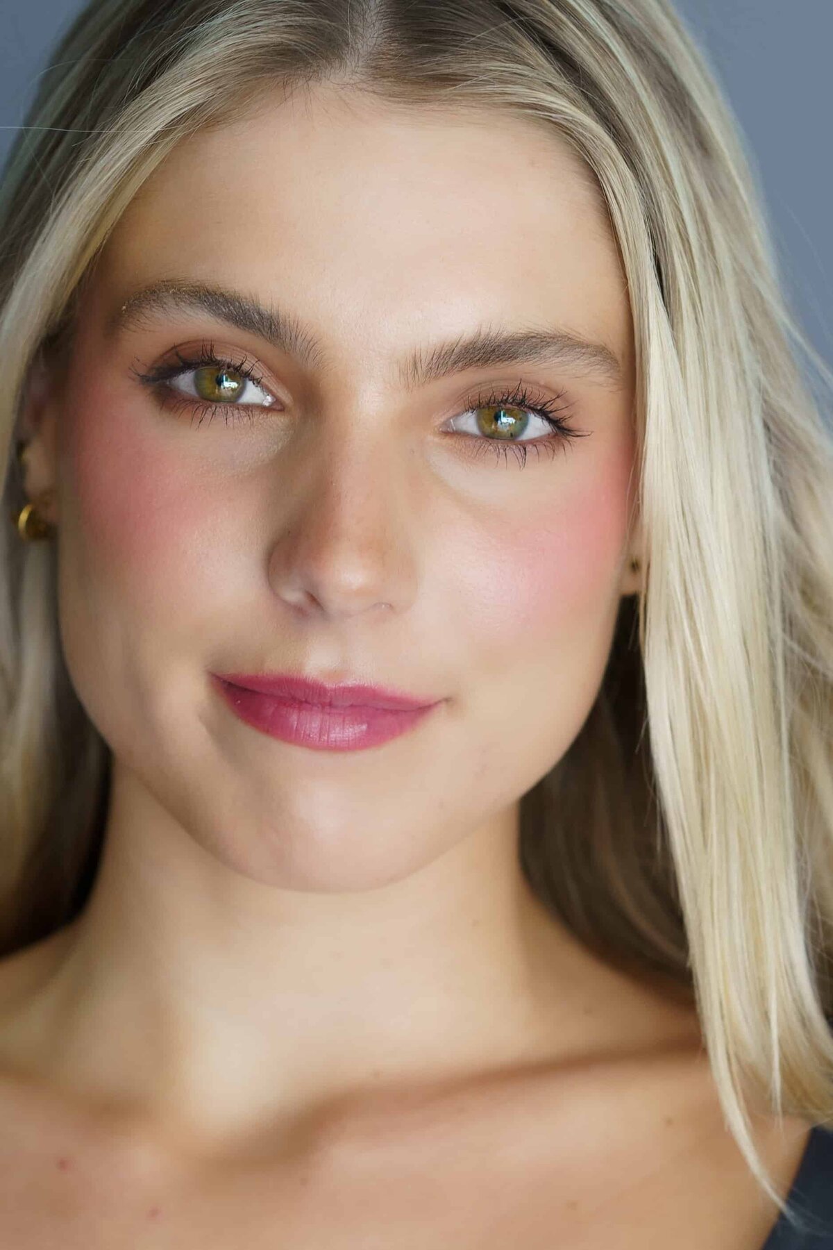 Close up headshot of a beautiful young woman with long hair