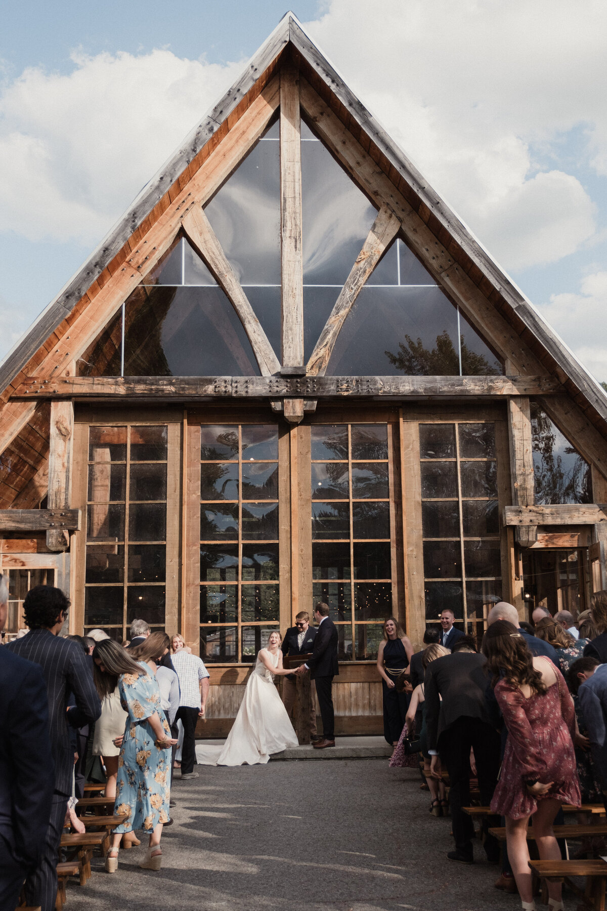 Quebec wedding ceremony on a bridge as guests are about to sit down