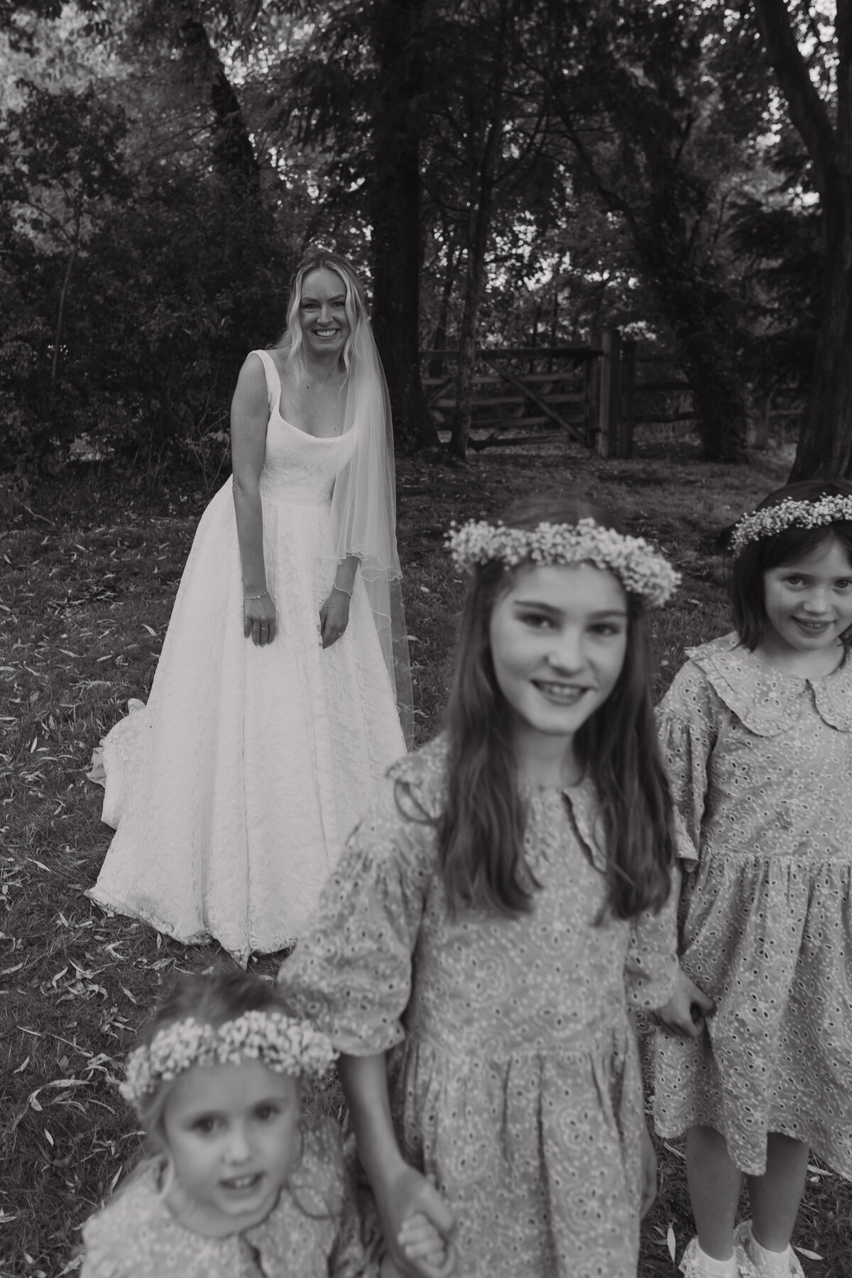 Wedding photographer captures couple taking a stroll hand in hand at their french chateau wedding.