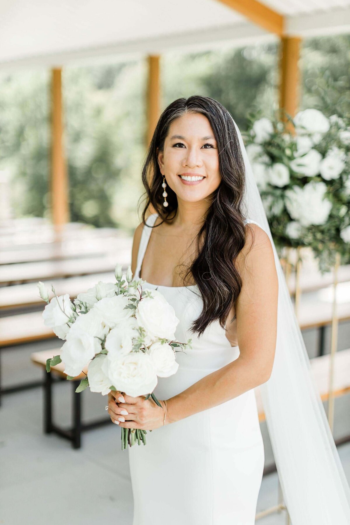 Michelle Kochvar wedding - bride holding flowers