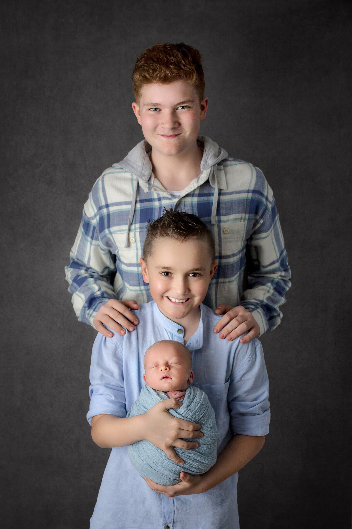 three brothers pose for haldimand county newborn photographer