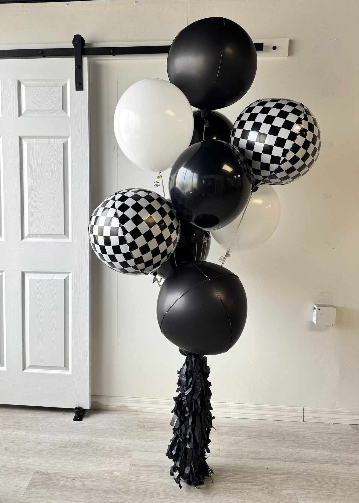 black checkered balloons