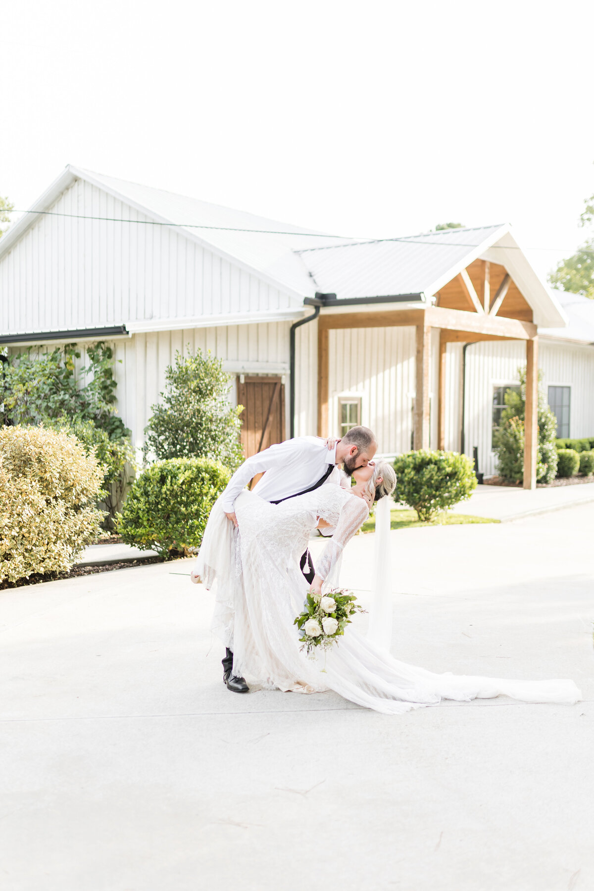 couple wedding portraits at winery wedding venue, koury farms