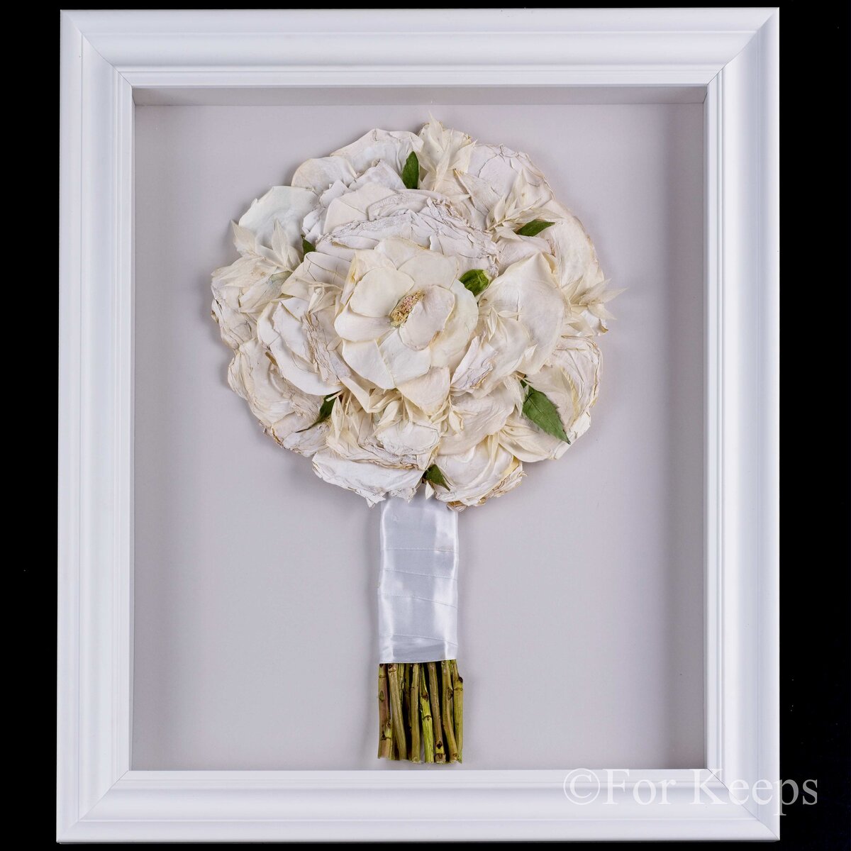 Pressed flowers with UV-protective glass