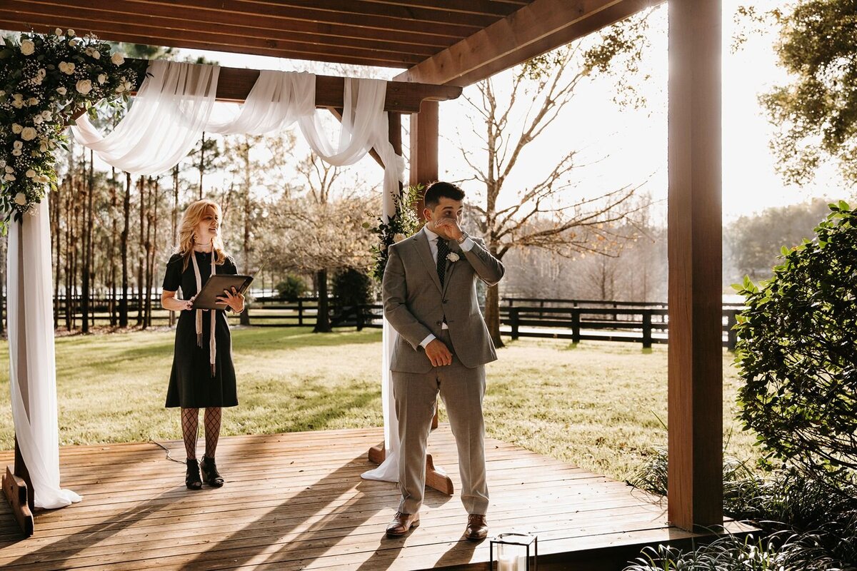 Grooms reaction as bride walks down the aisle at Club Lake Plantation, FL